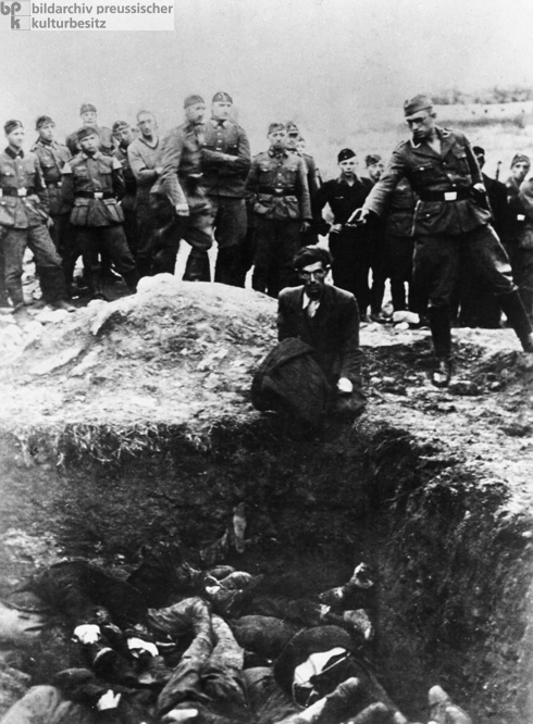 Ukrainian Jews are Shot by Members of a Mobile Killing Squad [<I>Einsatzgruppe</i>] (1942)